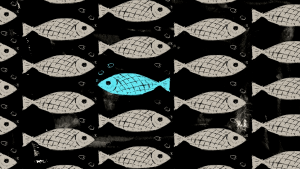 Un banco di pesci disegnati su sfondo nero tutti bianchi che vanno verso destra e solo uno, al centro, azzurro che va a sinistra